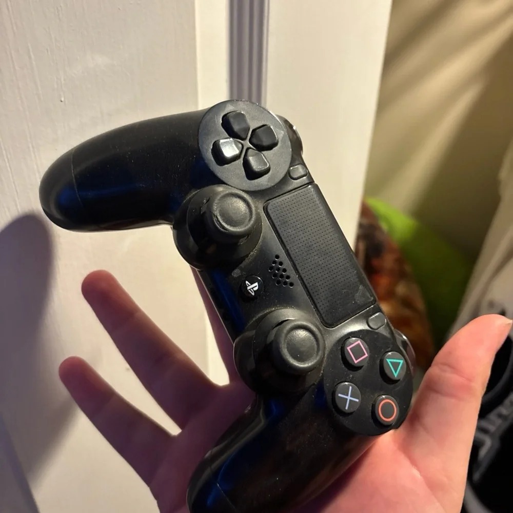 Sony PlayStation 4 Console in Black with Multicolor Logo